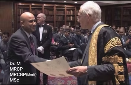 Dr M receiving his MRCP certificate